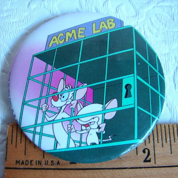 Vtg 1995 Pinback Button: Pinky & the Brain, Acme Lab Cage, Animaniacs Cartoon - Picture 1 of 3